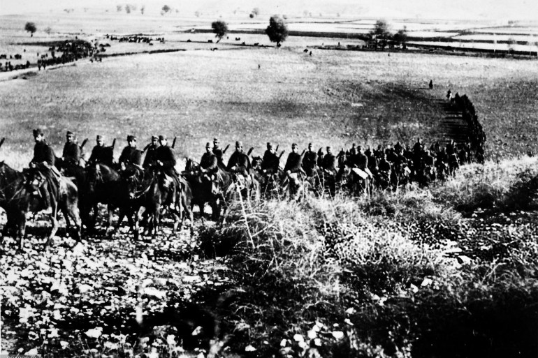Second Balkan War, 1912 ? 1913, Greek soldiers on the move, leaving the flat agricultural land behind, they approach the rocky hillside climb (Photo by Paul Popper/Popperfoto via Getty Images/Getty Images)