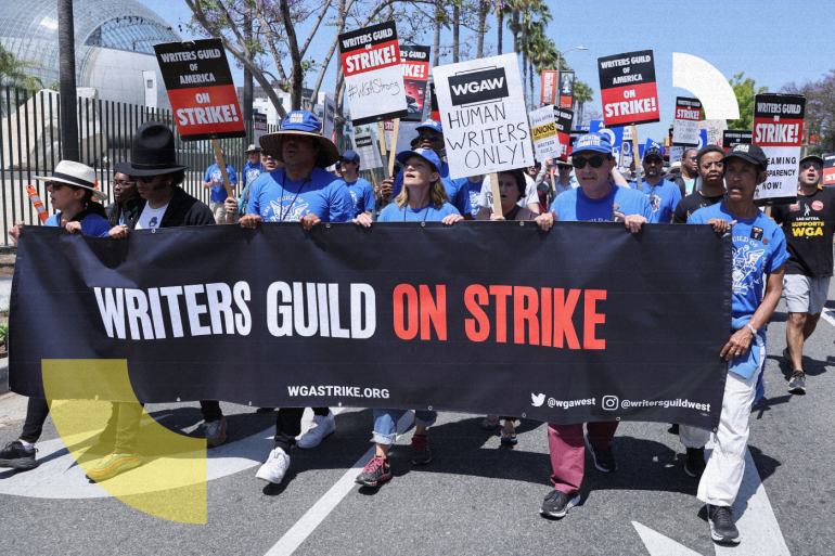 People attend a demonstration held by the Writers Guild of America as the film and TV writers' strike continues, in Los Angeles, California, U.S., June 21, 2023. REUTERS/Mike Blake