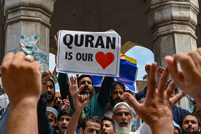People take part in a demonstration in Peshawar on July 7, 2023, as they protest against the burning of the Koran outside a Stockholm mosque that outraged Muslims around the world. (Photo by Abdul MAJEED / AFP)