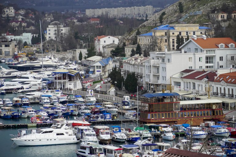 SEVASTOPOL, CRIMEA - MARCH 20: A view of yacht marina at the city of Balaklava in Sevastopol, Crimea on March 20, 2023. The Genoese fortress, which has history dates back to very ancient times with its historical values, attracts the attention of its visitors with its walls and historical texture that defies the years that located in the city of Balaklava on the Crimean peninsula. (Photo by Stringer/Anadolu Agency via Getty Images)