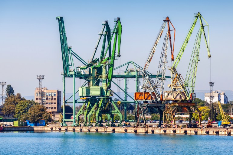 Cargo cranes, summer view of Varna port, Bulgaria; Shutterstock ID 480973873; purchase_order: aljazeera ; job: ; client: ; other: