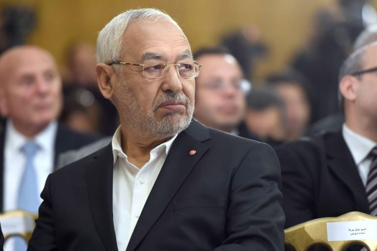 Tunisia's Ennahdha Islamist Party Leader Rached Ghannouchi looks on during a handover ceremony attended by the country's newly elected government in Tunis on February 6, 2015. A secular-led coalition government that includes Islamists took office in Tunisia, three months after the North African state's first free parliamentary elections. AFP PHOTO / FETHI BELAID (Photo by Fethi Belaid / AFP)