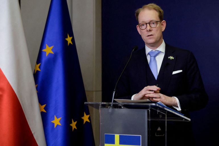 FILE PHOTO: Sweden's Foreign Minister Billstrom and his Polish counterpart Rau attend the press conference in Warsaw