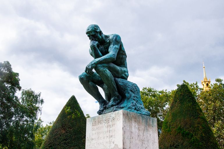 PARIS, FRANCE - September 30, 2015: Statue of "The Thinker" in the park-museum of sculptures by Auguste Rodin in Paris, France.