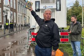 THE HAGUE, NETHERLANDS - SEPTEMBER 23: Edwin Wagensveld, Dutch leader of PEGIDA (Patriotic Europeans Against the Islamisation of the West) tears the Holy Quran in front of the Turkish Embassy in The Hague, Netherlands on September 23, 2023.