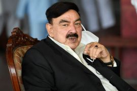 Pakistani Railways Minister Sheikh Rasheed Ahmad sits before speaking to media at the Rawalpindi Railway Station in Rawalpindi on June 26, 2020 after his recovery from the COVID-19 coronavirus. (Photo by Aamir QURESHI / AFP)