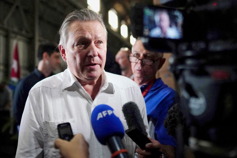 Russia's ambassador to Cuba Viktor Koronelli speaks to journalists during a sunflower oil donation ceremony at a warehouse in Havana, Cuba, September 27, 2023. REUTERS/Alexandre Meneghini