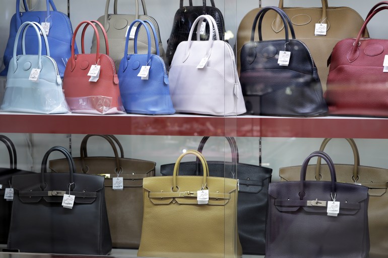 Second-hand Hermes International SCA Bolide and Birkin handbags are displayed for sale at a Daikokuya Inc. store in the Shinjuku district of Tokyo, Japan, on Monday, March 19, 2018. Japan's resale market for luxury brand goods is worth almost 200 billion yen, according to a government report. Photographer: Kiyoshi Ota/Bloomberg via Getty Images