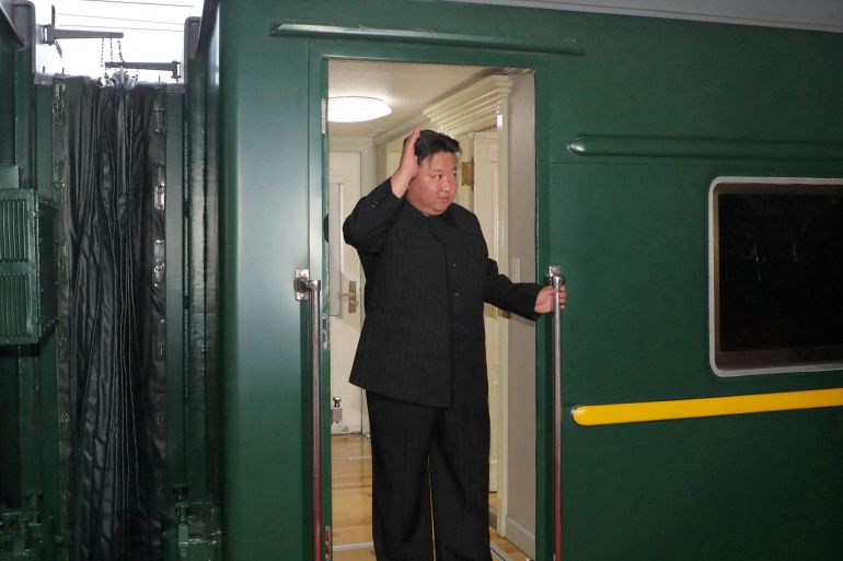 North Korean leader Kim Jong Un waves from a private train as he departs Pyongyang, North Korea, to visit Russia, September 10, 2023, in this image released by North Korea's Korean Central News Agency on September 12, 2023. KCNA via REUTERS ATTENTION EDITORS - THIS IMAGE WAS PROVIDED BY A THIRD PARTY. REUTERS IS UNABLE TO INDEPENDENTLY VERIFY THIS IMAGE. NO THIRD PARTY SALES. SOUTH KOREA OUT. NO COMMERCIAL OR EDITORIAL SALES IN SOUTH KOREA.