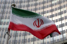 FILE PHOTO: The Iranian flag flutters in front of the International Atomic Energy Agency (IAEA) organisation's headquarters in Vienna, Austria, June 5, 2023. REUTERS/Leonhard Foeger//File Photo