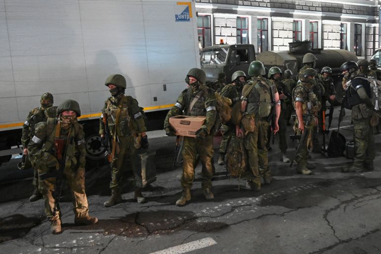 Fighters of Wagner private mercenary group pull out of the headquarters of the Southern Military District to return to base, in the city of Rostov-on-Don, Russia, June 24, 2023. REUTERS/Stringer