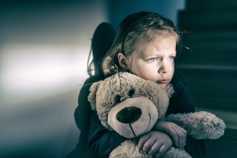 Little girl embracing her teddy bear - feels lonely - if you are small sad girl teddy bear is willing to be your best friend - instagram filter applied; Shutterstock ID 519548218; purchase_order:ى; job:; client:; other: