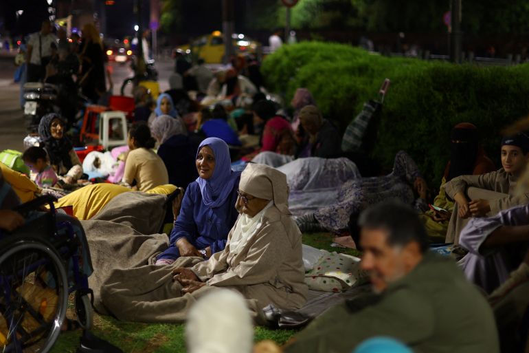 Residents rest in central Marrakesh following a powerful earthquake in Morocco, September 9, 2023. REUTERS/Hannah McKay