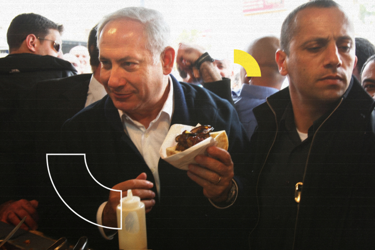 TIBERIUS, ISRAEL - FEBRUARY 08: (ISRAEL OUT) Israeli opposition leader Benjamin Netanyahu stops at a falafel stand during a campaign tour, February 8, 2009 in Tiberius, Israel. The truce between Israel and Hamas has become increasingly tenuous, posing a challenge to the centrist-led Israeli government as the February 10 elections near. (Photo by Uriel Sinai/Getty Images)