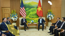 Vietnam's Prime Minister Pham Minh Chinh and US President Joe Biden hold a meeting at the Government Office in Hanoi on September 11, 2023. The United States and Vietnam warned against the "threat or use of force" in the disputed South China Sea, days after the latest clash involving Chinese vessels. (Photo by SAUL LOEB / AFP)