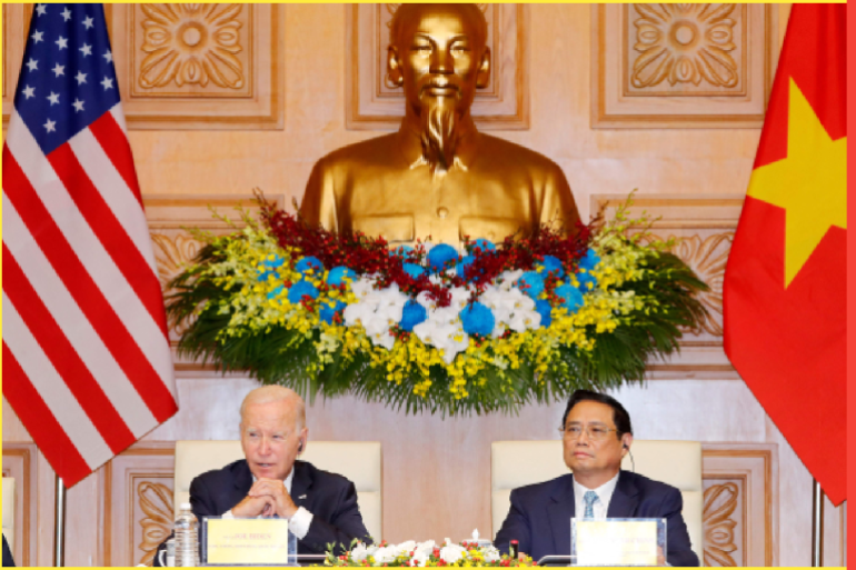 Vietnam's Prime Minister Pham Minh Chinh and US President Joe Biden hold a meeting with CEOs at the Government Office in Hanoi on September 11, 2023. The United States and Vietnam warned against the "threat or use of force" in the disputed South China Sea, days after the latest clash involving Chinese vessels. (Photo by Minh Hoang / POOL / AFP)