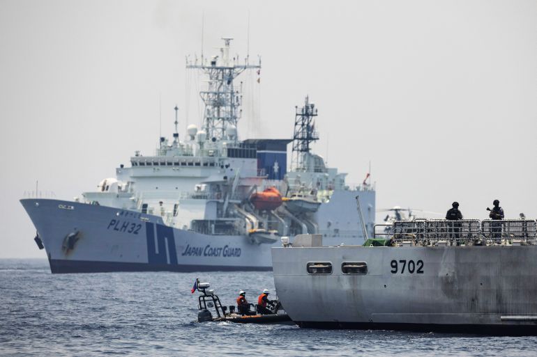Philippine Coast Guard's BRP Melchora Aquino (MRRV-9702) and Japan Coast Guard's Akitsushima (PLH-32) participate in drills to improve search and rescue collaboration and enforcement during the first trilateral coast guard exercise between the Philippines, Japan, and the U.S., at the coast of Bataan, Philippines in the South China Sea, June 6, 2023. REUTERS/Eloisa Lopez