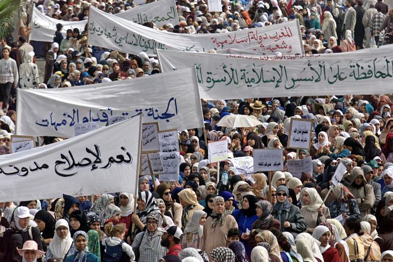 Some 200,000 supporters of Islamic hardliners demonstrate during a rally called by the opposition PJD party (Justice and Development) and the banned policital party Al Adel Oua Al Isshane (Justice and God Deeds) in protest against government plans to improve women's rights 12 March 2000 in Casablanca. Women and men march separately during the protest. Meanwhile, in Rabat, more than 100 feminist groups and politicians from nearly all parties gathered in support of the plans, which would allow greater divorce rights for women, raise the minimum age of marriage from 14 to 18, and ban polygamy. (Photo by ABDELHAK SENNA / AFP)