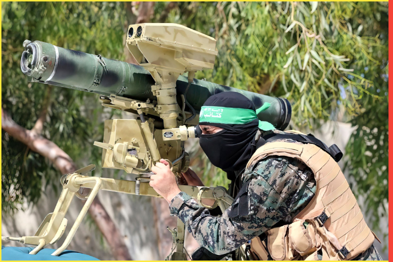 File photo published by Hamas (Islamic Resistance Movement) shows shows Al Qassam brigades training on ...