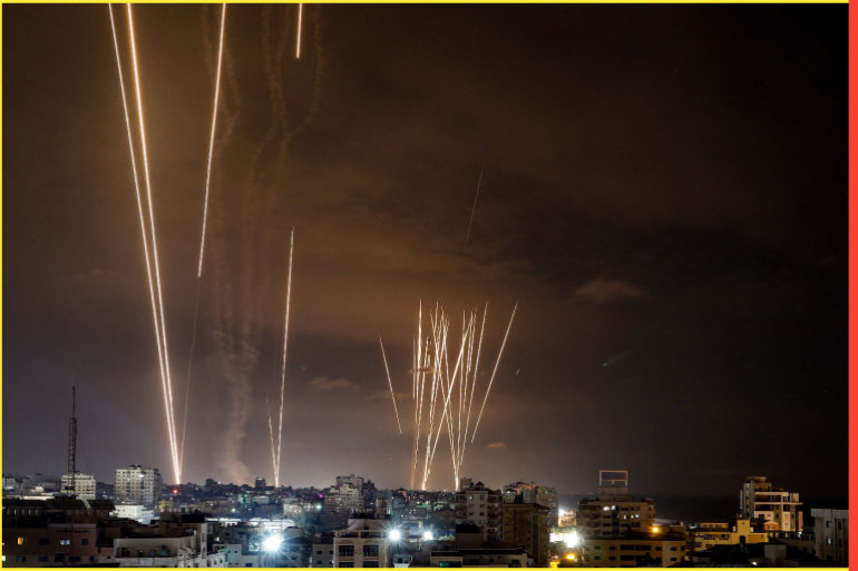 EDITORS NOTE: Graphic content / A salvo of rockets is fired by Palestinian militants from Gaza City toward Israel on October 7, 2023. At least 70 people were reported killed in Israel, while Gaza authorities released a death toll of 198 in the bloodiest escalation in the wider conflict since May 2021, with hundreds more wounded on both sides. (Photo by EYAD BABA / AFP)