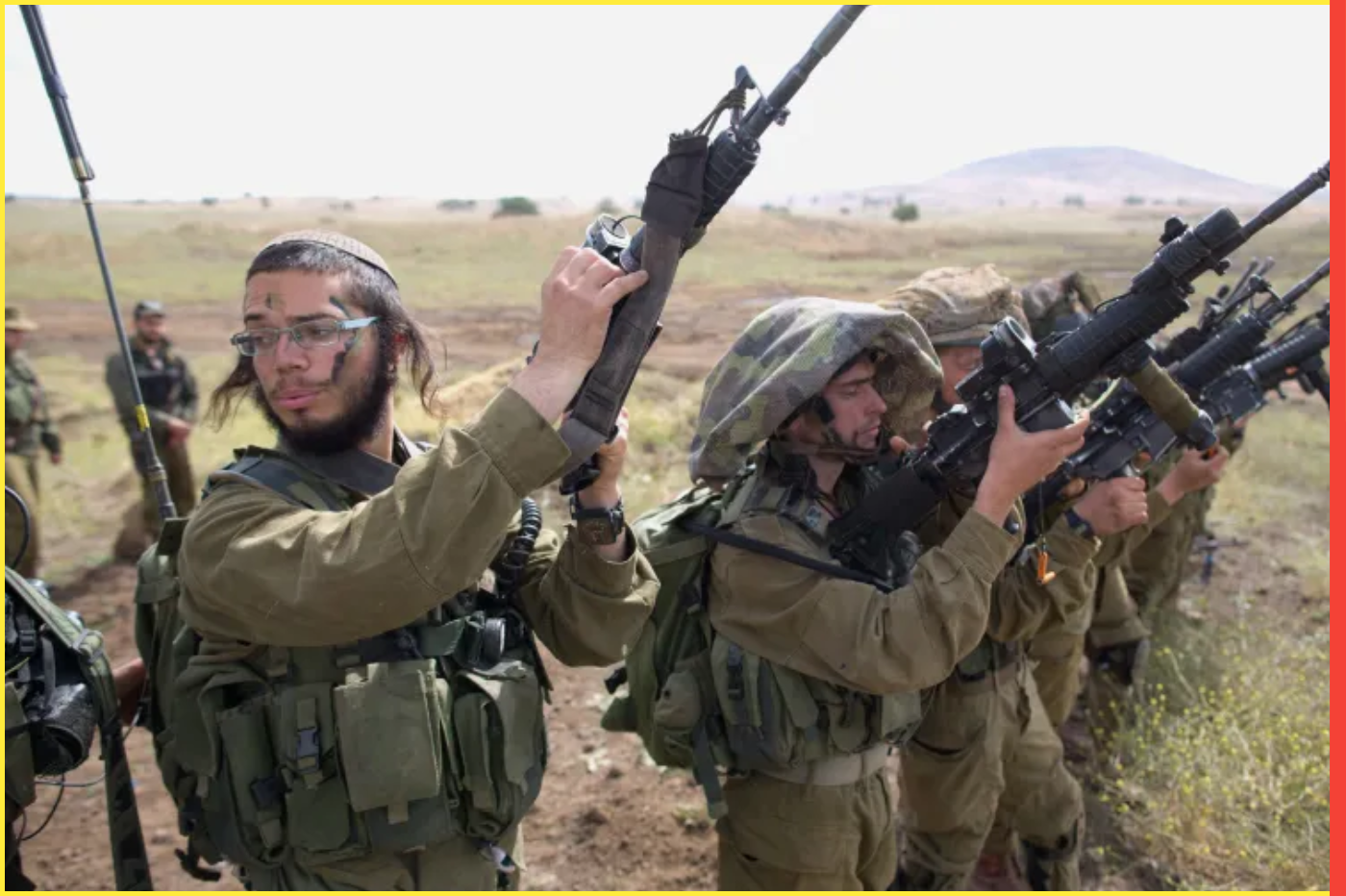 Israeli soldiers of the Ultra-Orthodox battalion "Netzah Yehuda" take part in their annual unit training in the Israeli annexed Golan Heights, near the Syrian border on May 19, 2014. The Netzah Yehuda Battalion is a battalion in the Kfir Brigade of the Israel military which was created to allow religious Israelis to serve in the army in an atmosphere respecting their religious convictions. AFP PHOTO/MENAHEM KAHANA (Photo credit should read MENAHEM KAHANA/AFP via Getty Images)