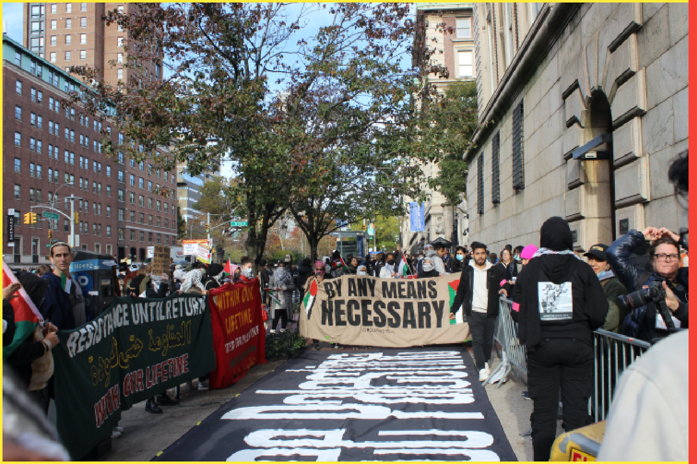 New York, NY USA - November 15, 2023 : People with banners at protest on Broadway outside of Columbia University campus after suspension of Students for Justice in Palestine group