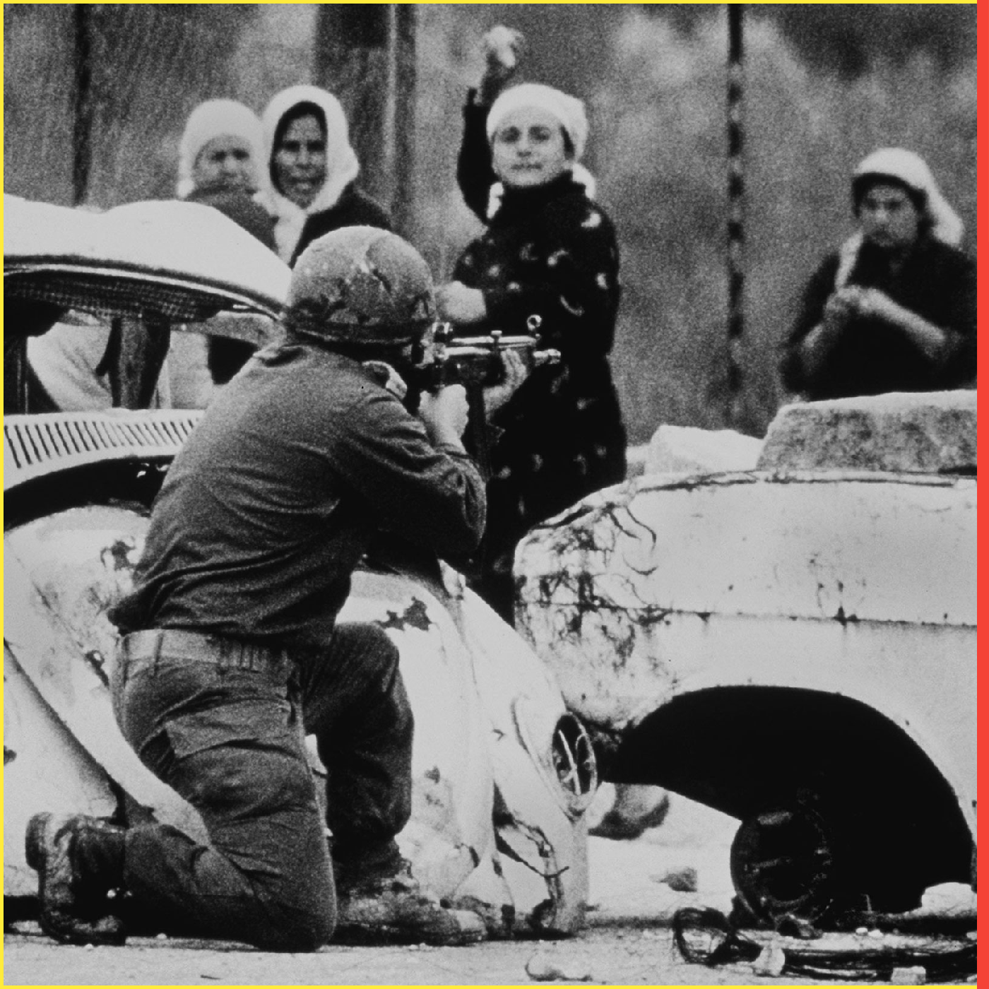 FILE PHOTO FEBRUARY 29, 1988 - An Israeli soldier takes aim as a Palestinian woman hurls a rock at him from close range during a demonstration in which one Palestinian youth was shot dead several months after the outbreak of the "intifada", or Palestinian uprising against Israeli occupation. Palestinians are marking the 10th anniversary of the intifada which began suddenly on December 9, 1987 in the Gaza Strip and spread quickly to the West Bank. The intifada gave birth to the Israeli - Palestinian peace accords, began in 1992 after the historic Madrid peace conference, but many Palestinians ten years later feel let down by the lack of results. MIDEAST INTIFADA