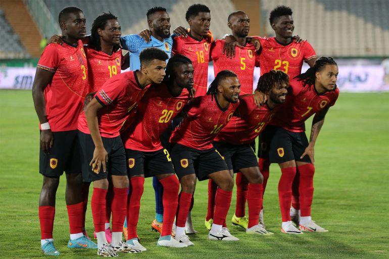 Angola's starting eleven pose for the group photo before the friendly football match between Iran and Angola at Azadi Stadium in Tehran on September 12, 2023. (Photo by ATTA KENARE and ATTA KENARE / AFP)