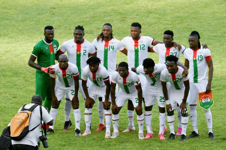Burkina Faso's national football team players pose for a photograph before a friendly football match between Ivory Coast and Burkina Faso at the Alassane Ouattara stadium in Ebimpe in Anyama on June 5, 2021. (Photo by Issouf SANOGO / AFP)