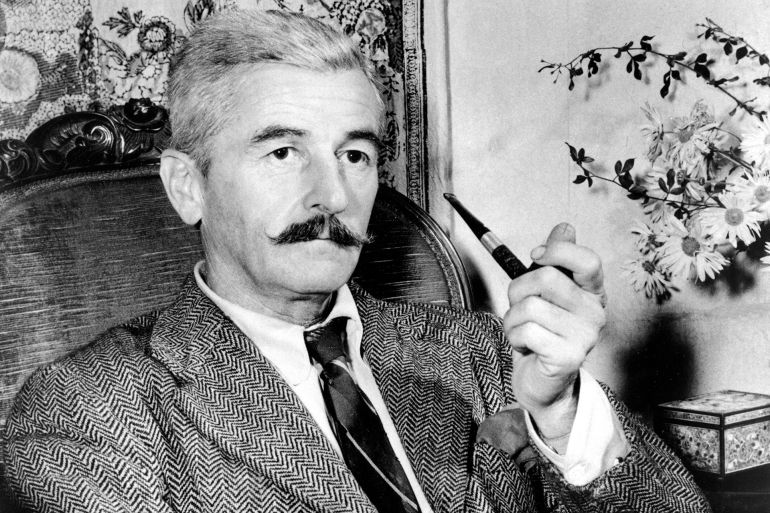 FILE - This 1950 file photo shows American novelist William Faulkner at his home in Rowan Oaks near Oxford, Miss. A literary conference at the University of Mississippi is focusing on the theme of families in William Faulkner’s work. The 46th annual Faulkner and Yoknapatawpha Conference opens Sunday, July 21, 2019 and runs through Thursday. (AP Photo, File)