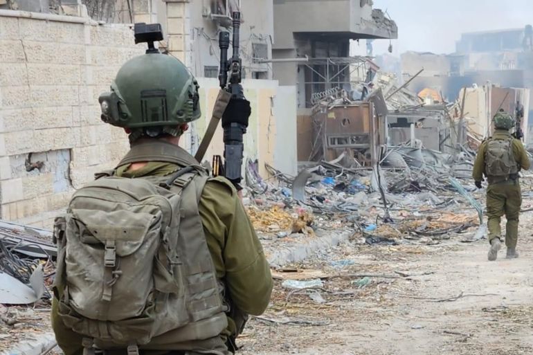 20_12_2023- قطاع غزة-جباليا-جندي إسرائيلي يرتدي خوذة عليها صورة الهيكل المزعوم- IDF