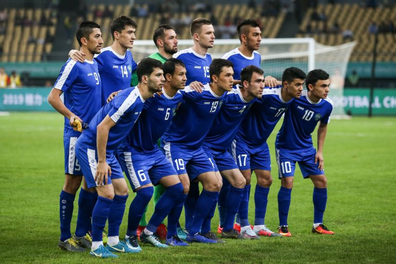 NANNING, CHINA - MARCH 22: Players of Uzbekistan line up for team photos prior to 2019 China Cup International Football Championship between Uruguay and Uzbekistan at Guangxi Sports Center on March 22, 2019 in Nanning, China. (Photo by Zhizhao Wu/Getty Images)