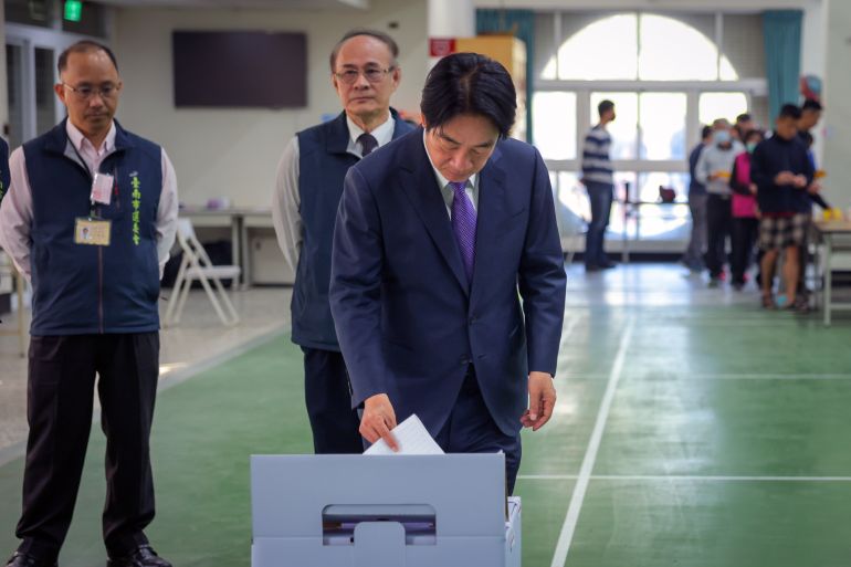 TAINAN, TAIWAN - JANUARY 13: Taiwan's Vice President and presidential candidate for the ruling Democratic Progressive Party (DPP) Lai Ching-te (C) casts his ballot to vote on January 13, 2024 in Tainan, Taiwan. Taiwan will vote in a general election on Jan. 13 that will have direct implications for cross-strait relations. (Photo by Annabelle Chih/Getty Images)