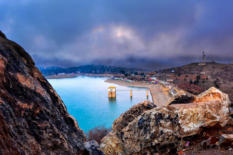 Qargha is a dam and reservoir in Afghanistan near Kabul. The reservoir and its peripheral areas provide for recreation facilities such as boating, surfing, golfing.; Shutterstock ID 1423636259; purchase_order: aljazeera ; job: ; client: ; other: