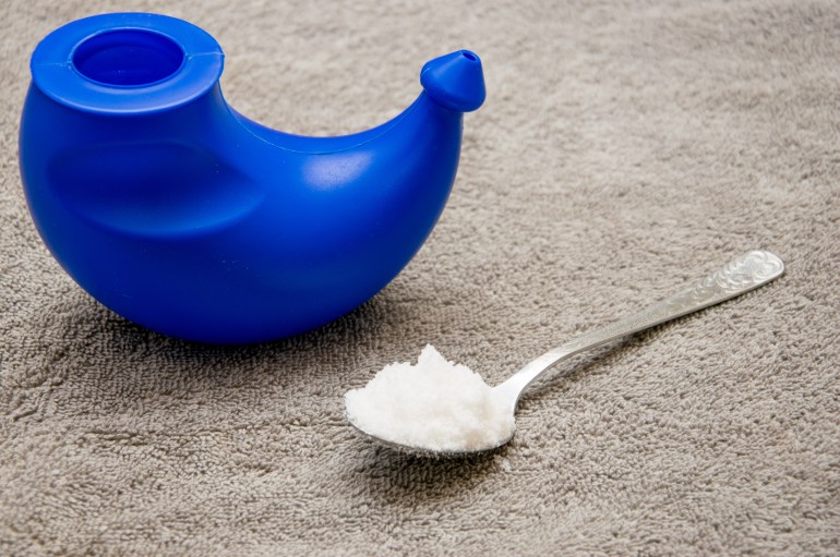The device for performing yoga practice - jala neti (washing the nose). Neti pot and salt for washing the nose.