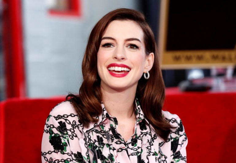 Anne Hathaway poses as she is honored with a star on the Hollywood Walk of Fame in Los Angeles, California, U.S., May 9, 2019. REUTERS/Mario Anzuoni
