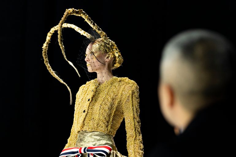 A model walks the runway during the Thom Browne fall/winter 2024 fashion show during New York Fashion Week, Wednesday, Feb. 14, 2024, in New York. (AP Photo/Peter K. Afriyie)