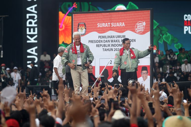 Presidential candidate and former Central Java governor Ganjar Pranowo and vice presidential candidate Mahfud MD are speaking on the stage during their election campaign at the Lapangan Simpanglima in Semarang, Central Java Province, Indonesia, on February 10, 2024, ahead of Indonesia's presidential and legislative polls scheduled to be held on February 14. (Photo by WF Sihardian/NurPhoto via Getty Images)