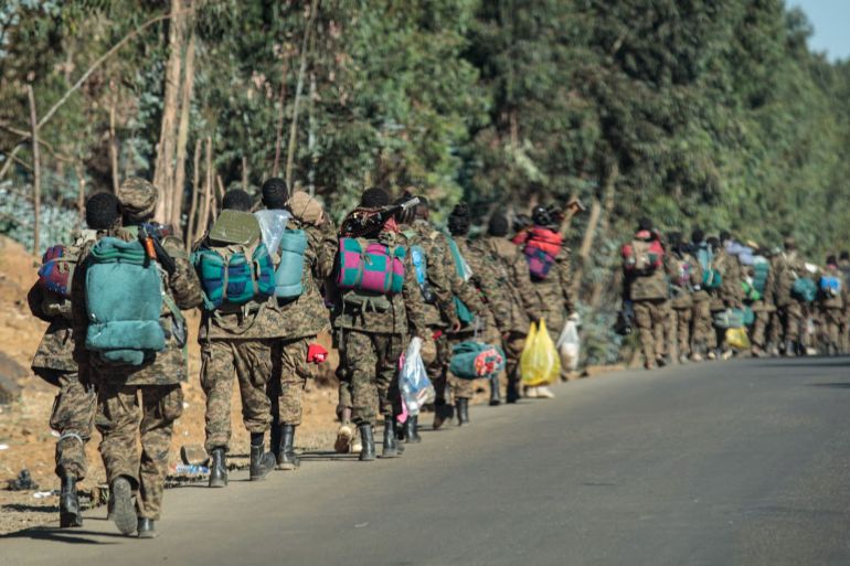 Ethiopian government soldiers near the frontline in Gashena, Ethiopia, December 2021. Photograph: Solan Kolli/AFP/Getty Images