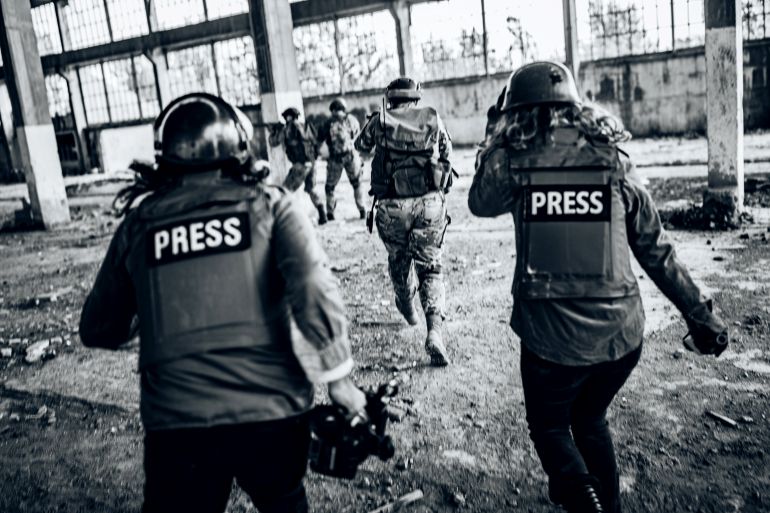 Two young journalists reporting from the war zone