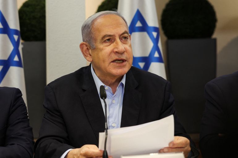 Israeli Prime Minister Benjamin Netanyahu speaks during the weekly cabinet meeting at the Defence Ministry in Tel Aviv, Israel, January 7, 2024. REUTERS/Ronen Zvulun/Pool
