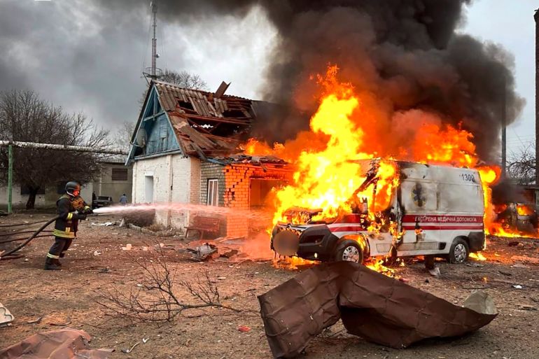 In this photo provided by the Ukrainian Emergency Service, firefighters extinguish a fire after a Russian rocket attack in Zolochiv, Kharkiv region, Ukraine, Friday, March 15, 2024. (Ukrainian Emergency Service via AP Photo)