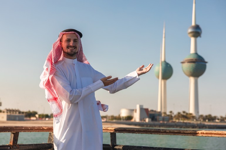 Portrait of a young sheik by the Kuwait towers.