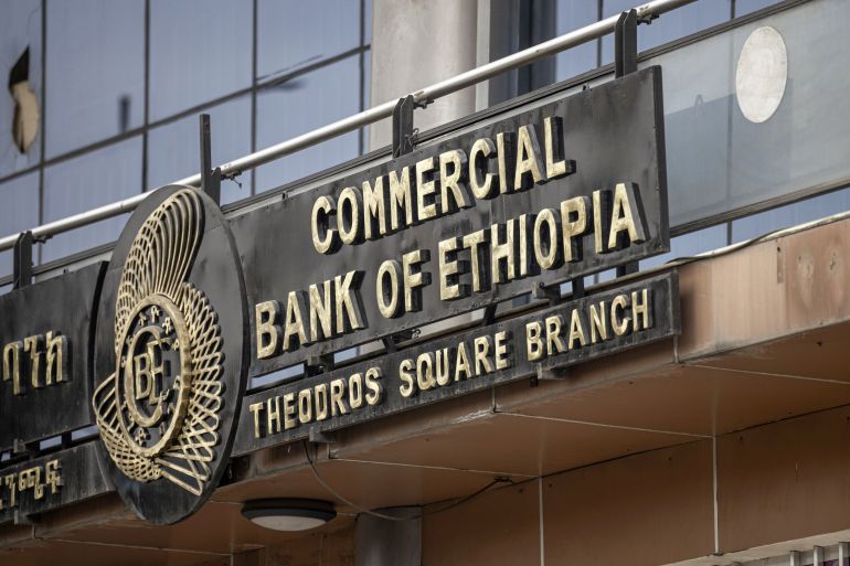Signage above the entrance to a branch of the Commercial Bank of Ethiopia in Addis Ababa, Ethiopia, on Thursday, Dec. 7, 2023. The Horn of Africa nation has been seeking to rework its liabilities since 2021 as a civil war in the northern Tigray region soured investor sentiment and sapped economic growth. Photographer: Michele Spatari/Bloomberg via Getty Images