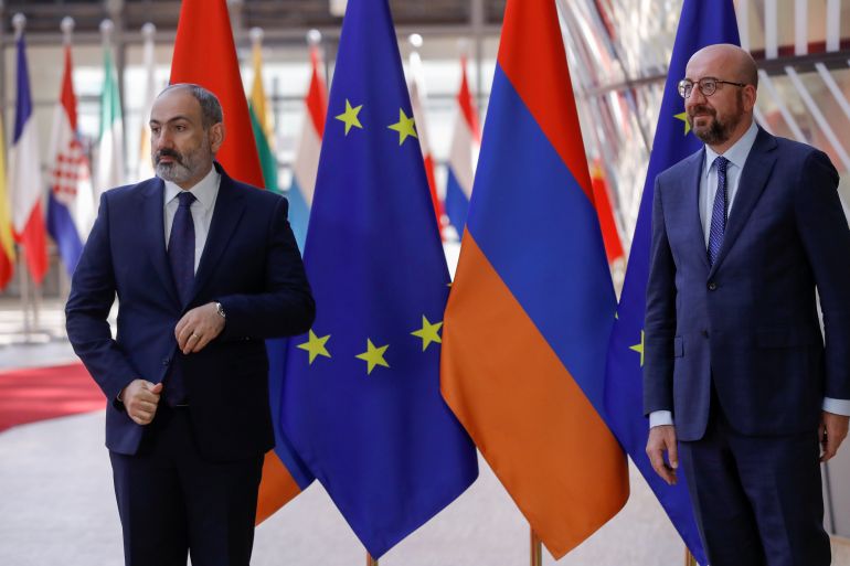 European Council President Charles Michel greets Armenian Prime Minister Nikol Pashinyan ahead of a meeting in Brussels, Belgium, June 2, 2021. Olivier Hoslet/Pool via REUTERS