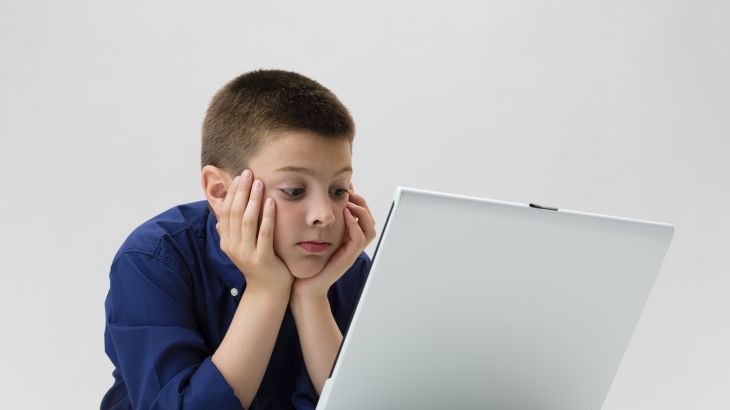 Boy looking in computer screen