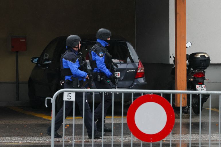 Police secure the area after a shooting in the Swiss town of Sion, Switzerland, December 11, 2023. REUTERS/Denis Balibouse
