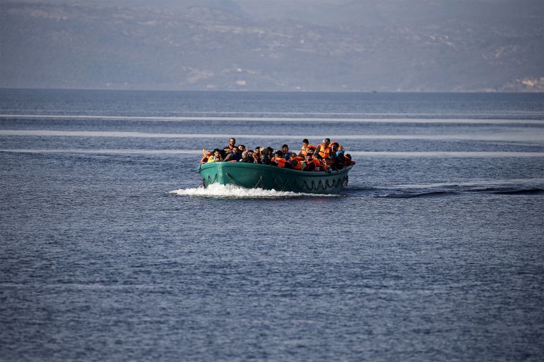 Refugees and migrants arrive on an overcrowded boat on the Greek island of Lesbos, November 10, 2015. Since the start of the year, over 590,000 people have crossed into Greece, the frontline of a massive westward population shift from war-ravaged Syria and beyond. REUTERS/Alkis Konstantinidis