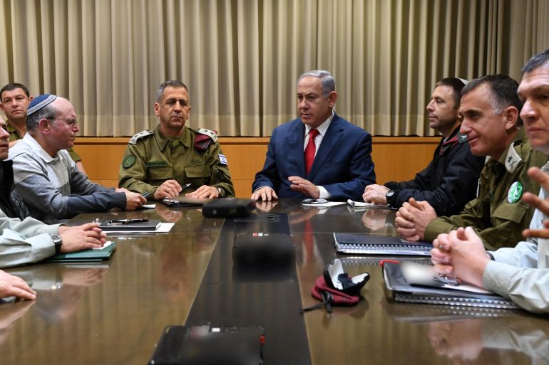 Israeli Prime minister Benjamin Netanyahu and Chief of staff Aviv Kohavi hold a security consulations at the Kirya Defense Ministry compound in Tel Aviv. March 14, 2019. Ariel Harmoni/GPO/Handout via REUTERS ATTENTION EDITORS - THIS PICTURE WAS PROVIDED BY A THIRD PARTY.
