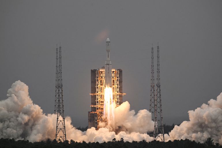 FILE PHOTO: A Long March-8 rocket, carrying the relay satellite Queqiao-2 for Earth-Moon communications, blasts off at the Wenchang Space Launch Center in Hainan province, China March 20, 2024. China Daily via REUTERS ATTENTION EDITORS - THIS PICTURE WAS PROVIDED BY A THIRD PARTY. CHINA OUT. NO COMMERCIAL OR EDITORIAL SALES IN CHINA./File Photo